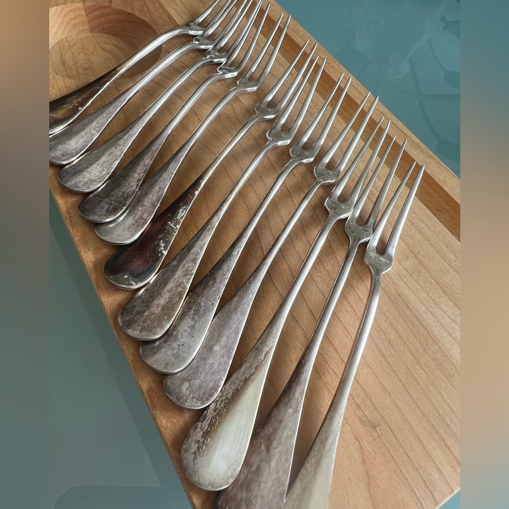 Snail forks, 12. 6in Overall. Made in France for Charles R Ruegger.